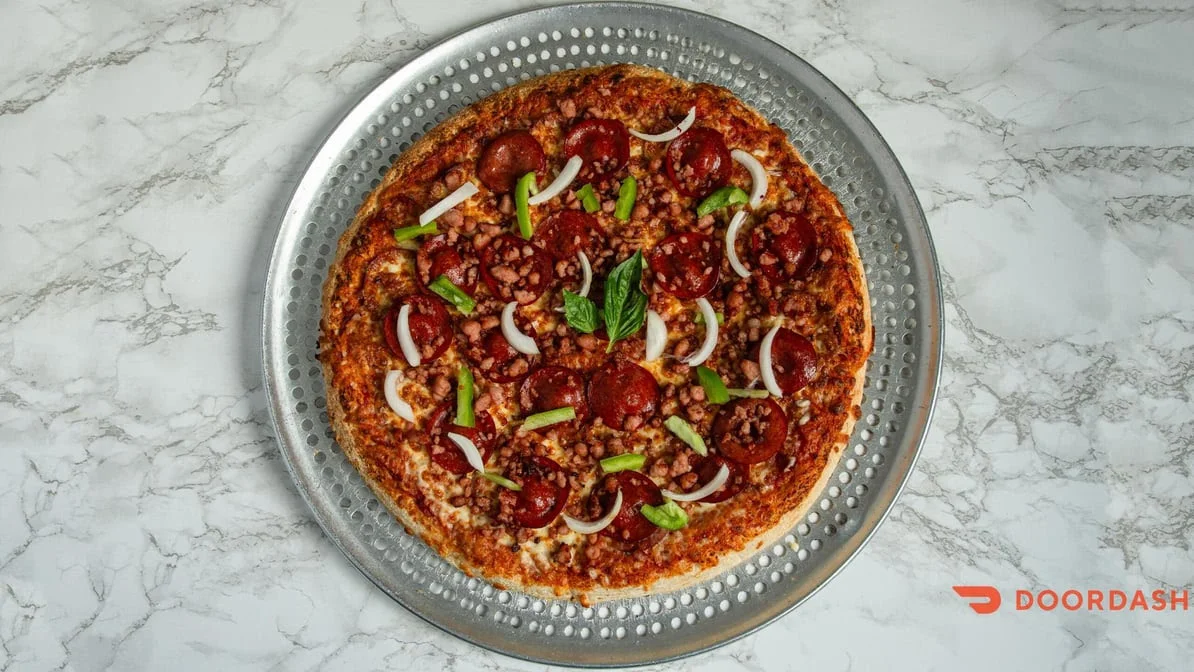 Hawaiian pizza with pineapple and ham at Jambo Pizza Sargent Ave Winnipeg