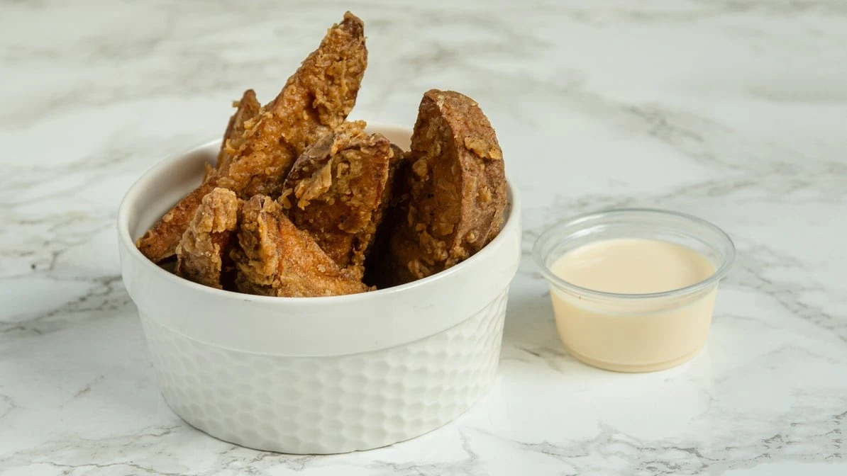 Crispy fried chicken with dipping sauce at Jambo Pizza, 818 Sargent Ave Winnipeg